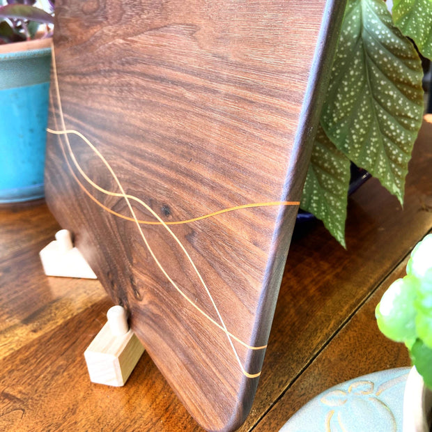 Peruvian Walnut charcuterie board - unique Maple and Cherry banding/inlay.